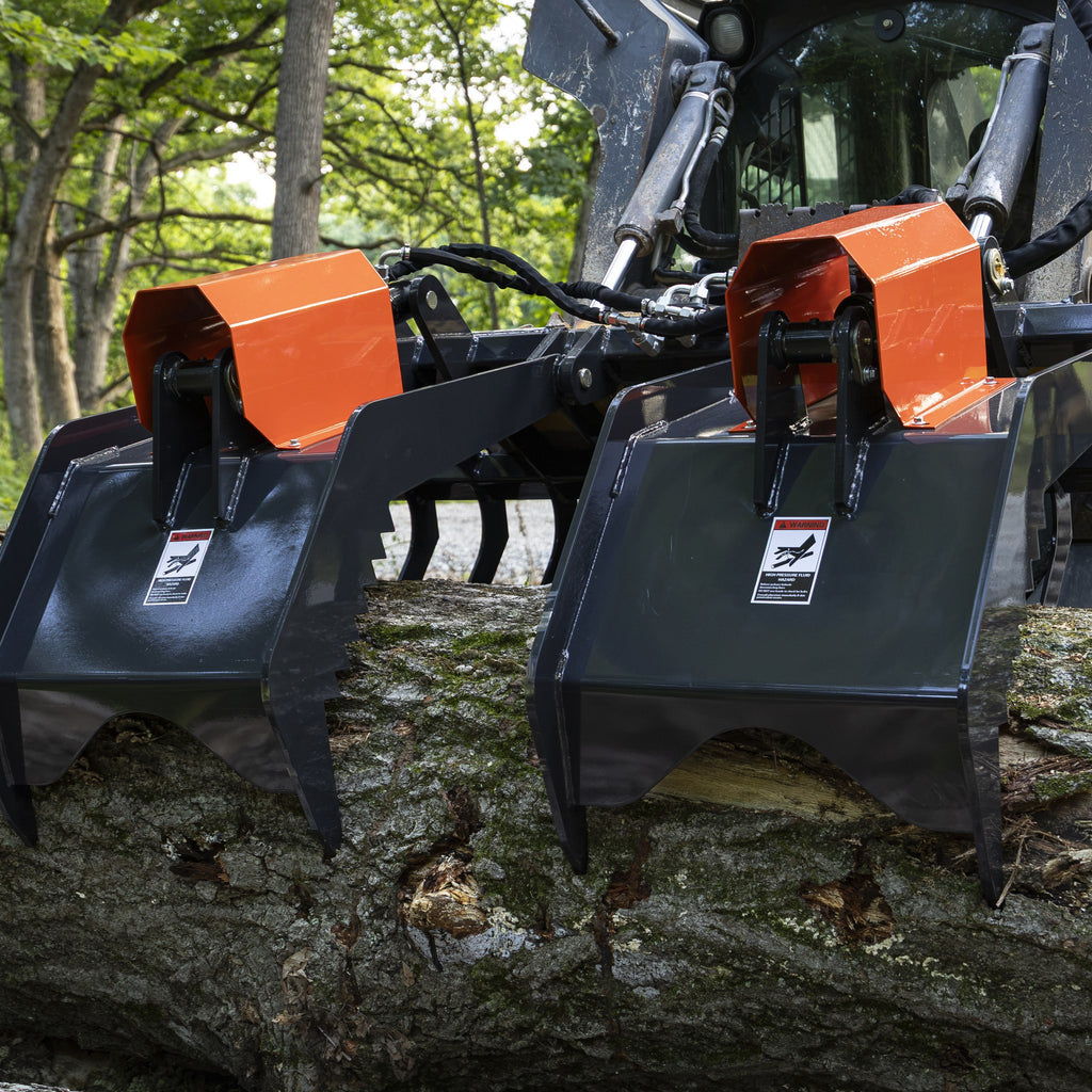 Rock grapple clamping a log